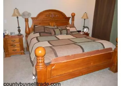 King bedroom suite with chest, two night stands and extra table